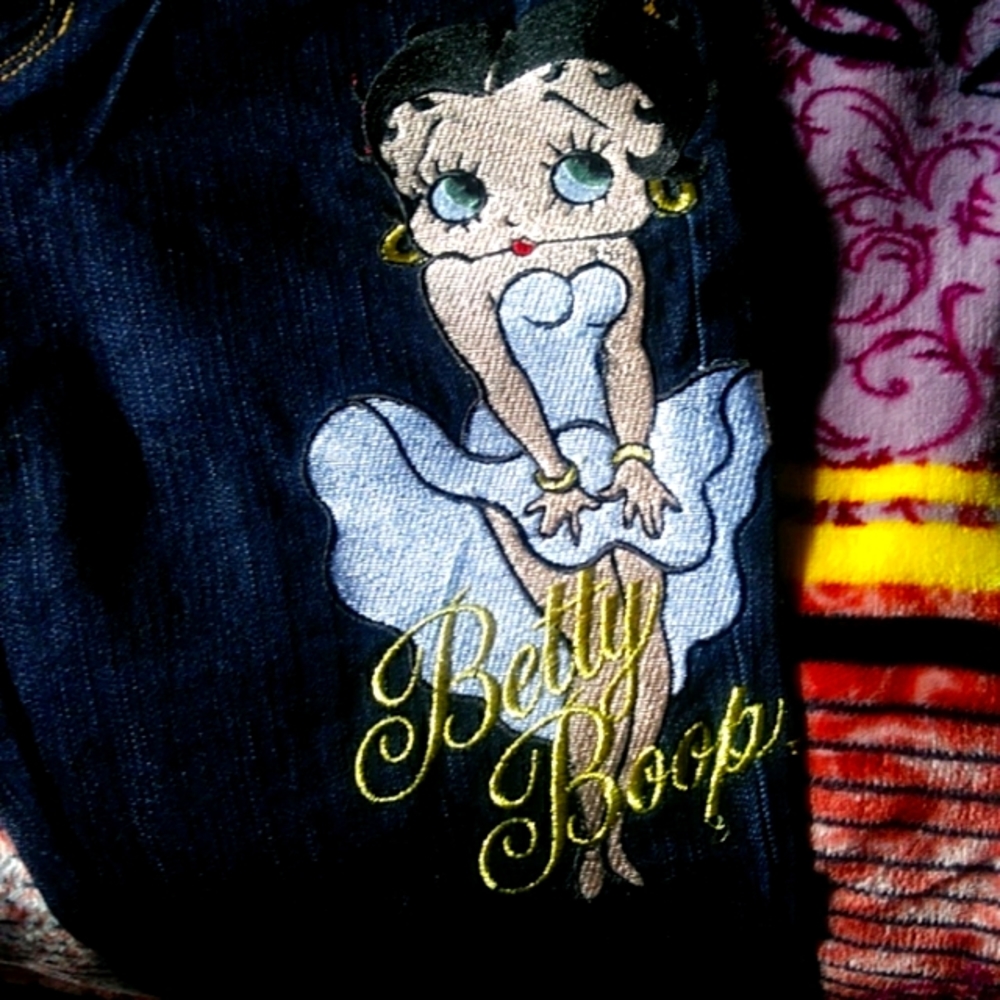 Jeans..Betty Boop embroidered on leg of jeans.  Size 5